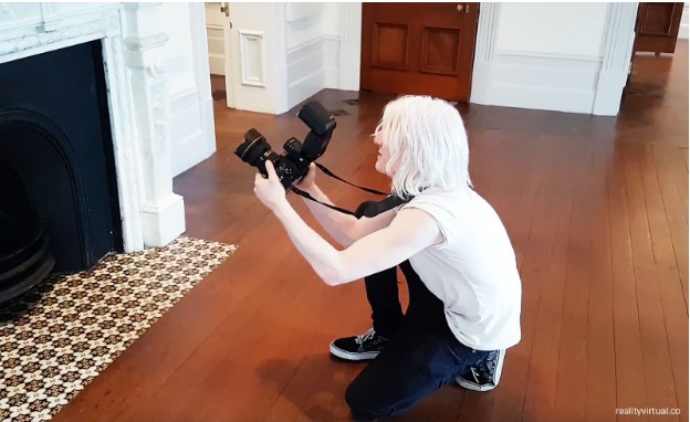 Simon Che de Boer takes high-resolution photos at the Sir James Wallace Homestead.